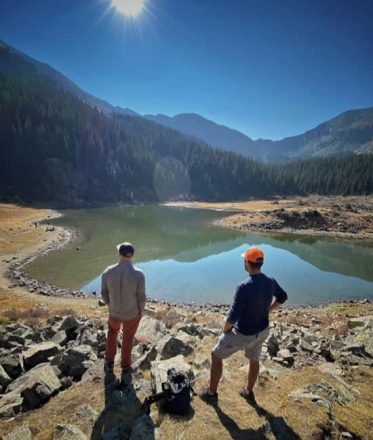 Andy and friend looking over lake