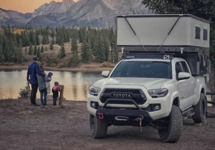 Toyota Popup Four Wheel Camper w Family Near Lake